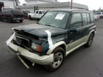 Driver Left Strut Front Fits 96-98 Sidekick 30757577 Used. Price: $110.70.