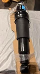 Oem Nissan Rear Air Shock 56200-ZV60A Armada 2005-2015 / QX56 2004-2010 New. Price: $150.00.